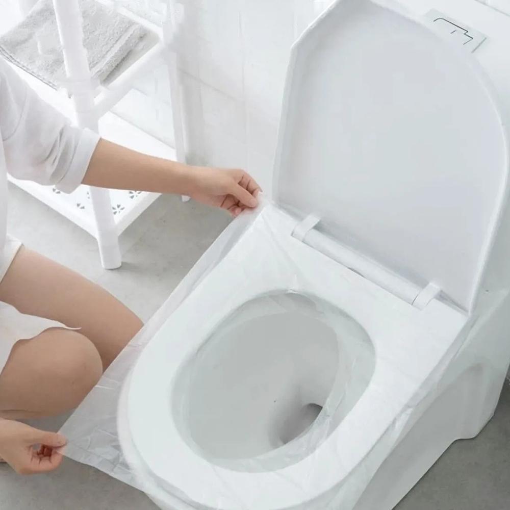 50pcs Disposable toilet seat cushion, household waterproof and dirt proof toilet seat cover, business and travel toilet cover