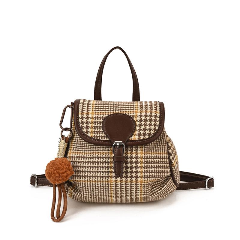 

Autumn and winter foreign style plaid hand carry backpack 2025 new Korean version versatile commuter small backpack trendy leisure bag women