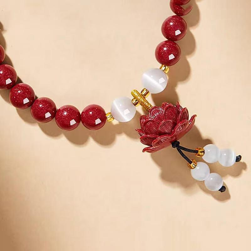 

Высококачественный браслет из киновари с фиолетовым песчаным лотосом и кошачьим глазом для девочек Gold Sand 6mm фиолетовый