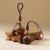 Green Sandalwood Hollow Mobile Phone Chain: Exquisite Aromatherapy Sachet Ball and Tibetan Incense Pendant Keychain in Ancient Style.