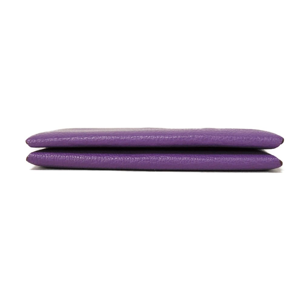 Used 9212 Calvi 7946 Chevre Mysore Goatskin Bag with Gold-stamped Logo and Purple Snap Buttons. Excellent Condition.