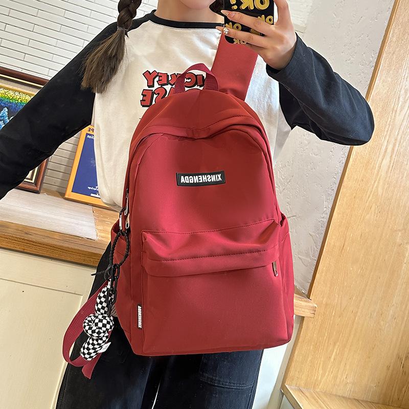 Elementary school bag, female junior high school student solid color backpack, high school student large capacity casual backpack fashion