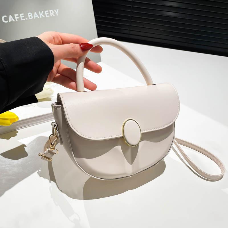 

Женская сумка новая трендовая высококлассная модная нишевая дизайнерская однотонная ретро сумка-мессенджер портативная сумка-седло белый