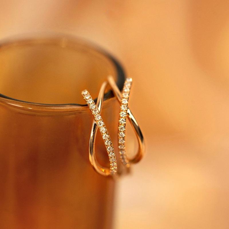 Two Interlocked Curved Hoop Half Pave Round Cubic Zirconia Earrings Gold Tone Snap Closure Elegant Office Ladies Accessories