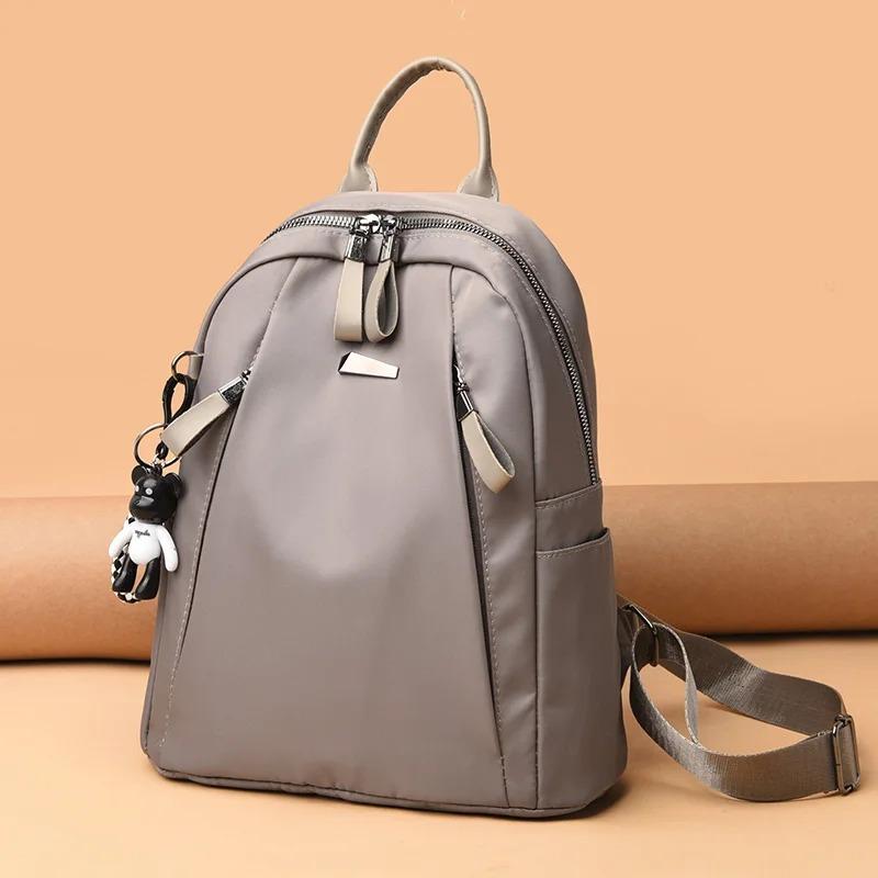 2026 New Large Capacity Simple Style Casual Mochila Travel Women Anti-theft Backpack Waterproof Fabric Large Female Shoulder Bag