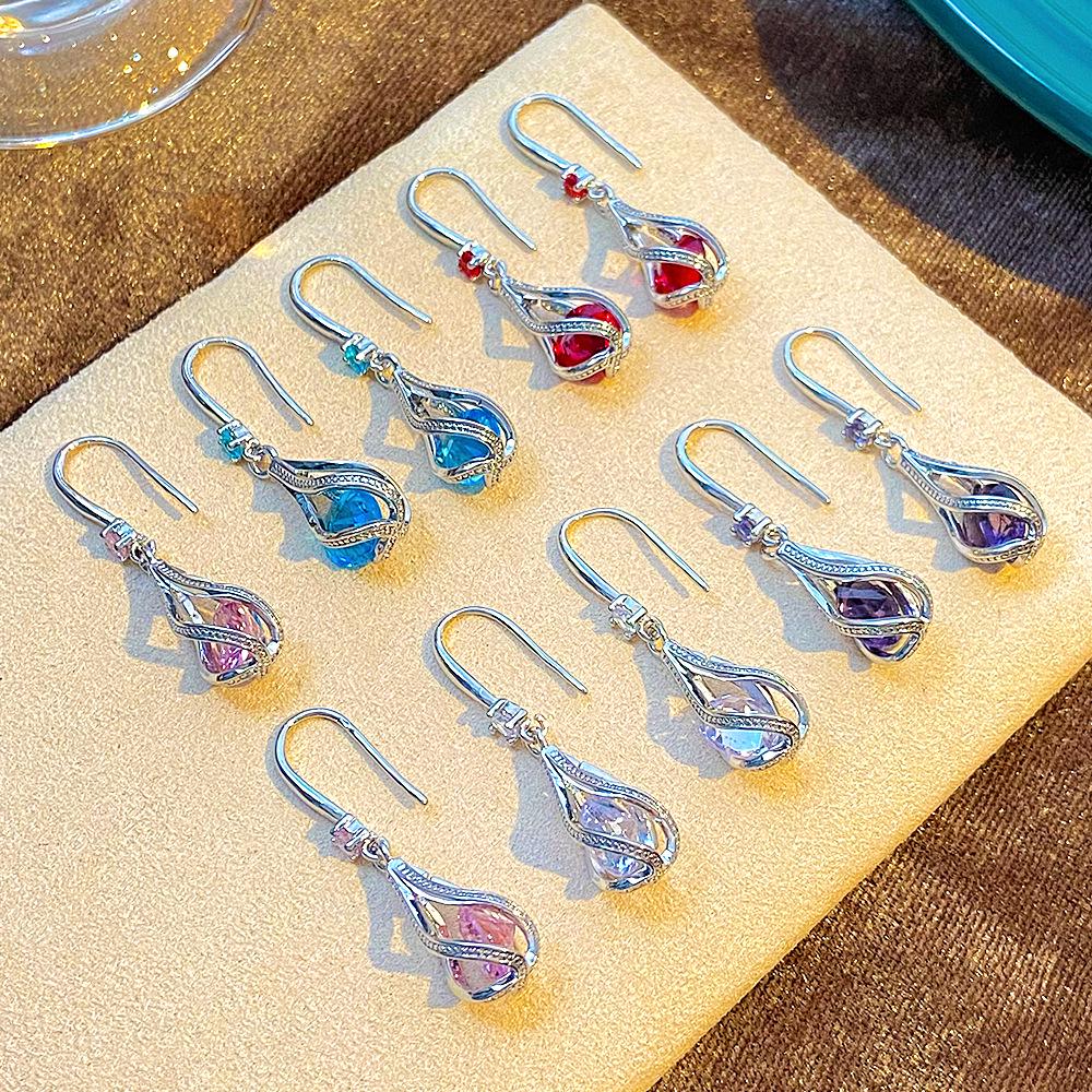 Zirkon Tropfen Kristallohrringe: Elegantes drehbares Hohldesign für Hochzeiten & Bräute