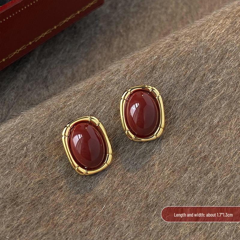 

Elegant Red Stud Earrings: Retro Hong Kong Style for Women - Versatile Autumn/Winter Niche Design.