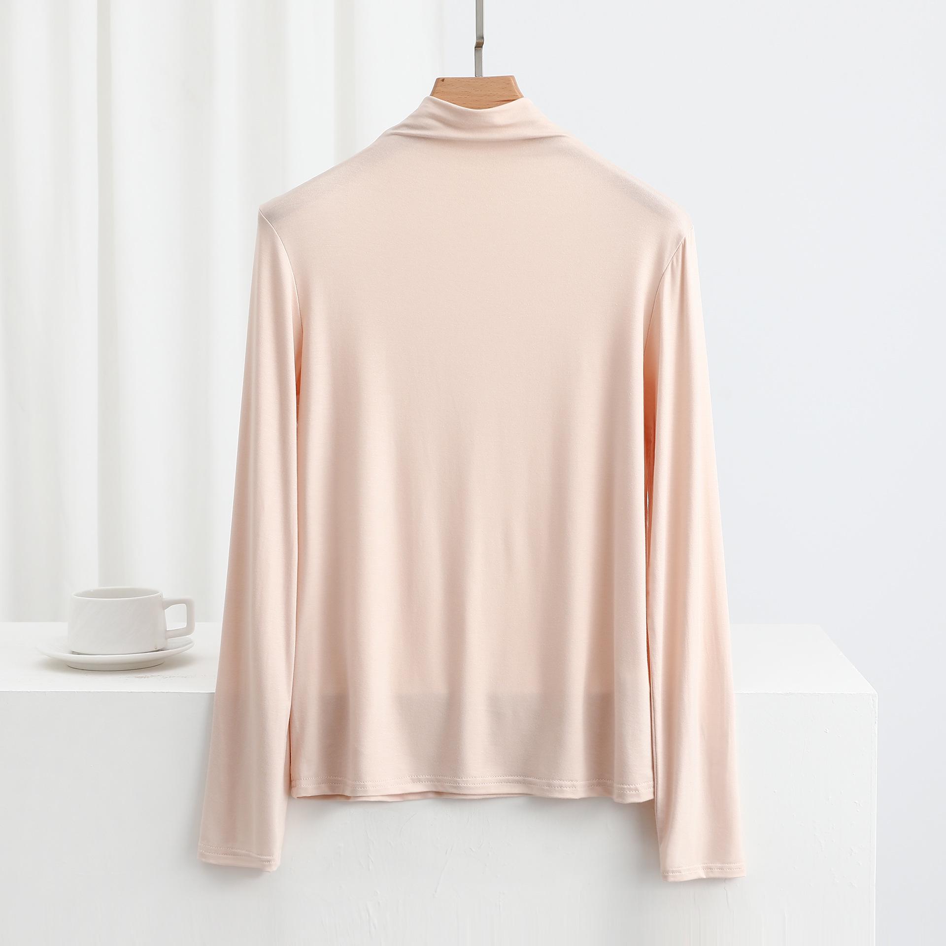 

Женская приталенная футболка с длинным рукавом из модала с полувысоким воротником для весны и осени M