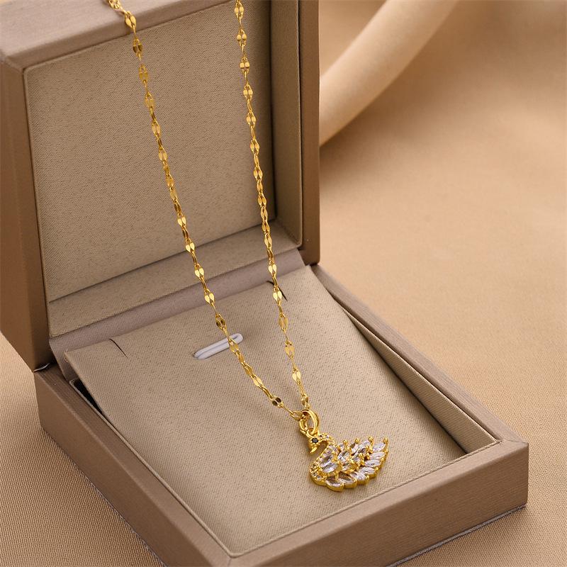 Elegant Colorfast 18K Rose Gold Necklace with Swan & Four-Leaf Clover Charm