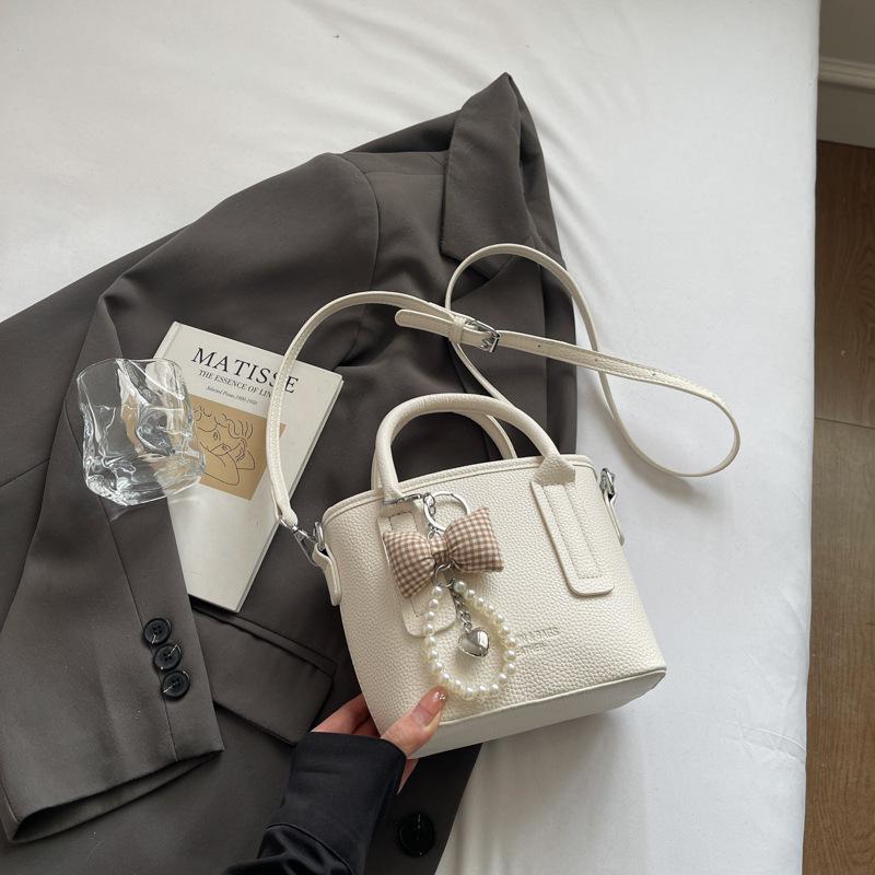 Autumn and winter new small bag women's premium texture portable bucket bag versatile retro commuter messenger bag