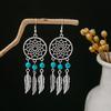 Peacock Tassel Earrings with Hollow Leaf Design in Retro Ethnic Style Imitation Silver for Women