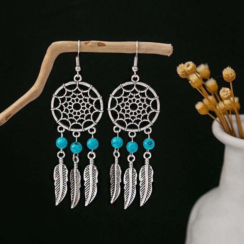 Peacock Tassel Earrings with Hollow Leaf Design in Retro Ethnic Style Imitation Silver for Women