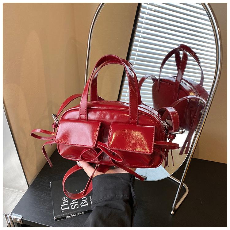 

Large-capacity bag women s new fashionable versatile shoulder underarm bag spring and summer portable bowling bag червоний