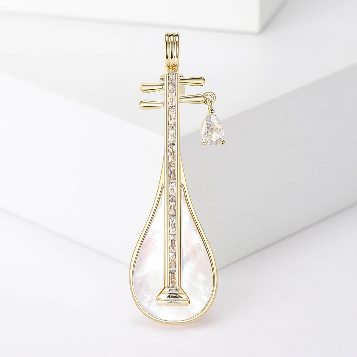 

Высококачественный инструмент Fritillary Pipa Брошь Универсальный аксессуар для костюма Булавка Личность Темперамент Свитер Декоративный корсаж