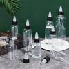 BENECREAT 15 Pack 50ml Transparent Plastic Dispensing Bottle with Twist Cap and Graduated Measurement for Liquids, Inks, Oils, Arts and Crafts