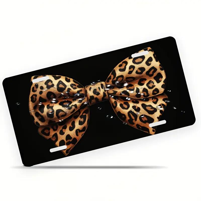 

Vintage Chic Leopard Print Bow Tie with Water Droplets License Plate D Flat Aluminum Tin Sign Wall Art Decor for Garage Bar Man 15x30cm(5.9x7.8inch)