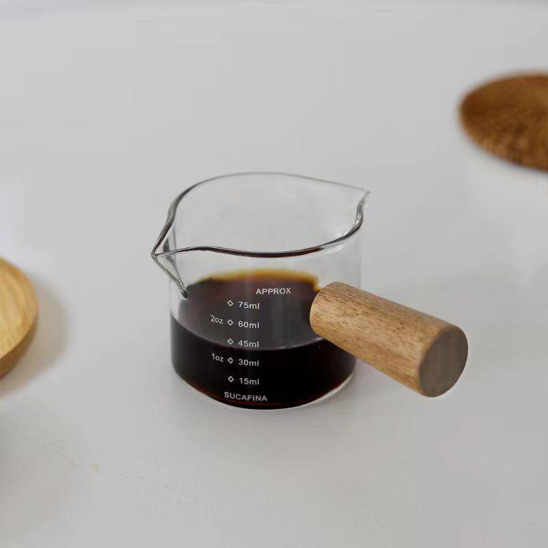 

Niche design extract espresso measuring cup seasoning pour milk can wooden handle graduated glass heat-resistant small milk cup