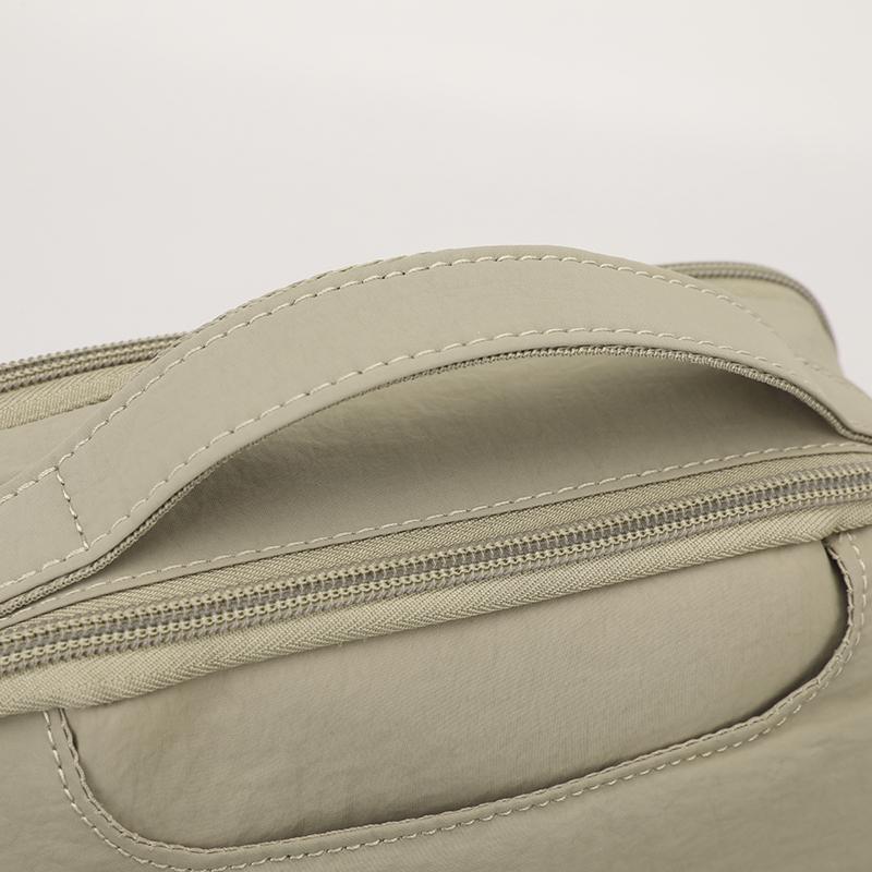 Nylonová crossbody taška s horním uchem a přední kapsou na zip pro muže i ženy pro každodenní použití
