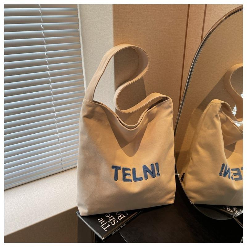 Canvas bag women's large-capacity new summer simple and versatile shoulder messenger bag college student tote bag