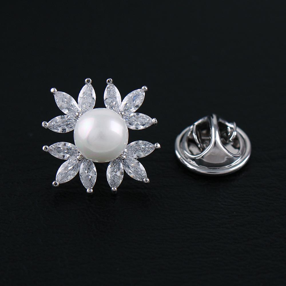 Gold-Plated Crystal Snowflake Brooch with Zircon and Pearl Details
