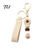 Anti Oxidation Metal Keychain Silicone Flower with Faux Leather Wristlet, Car Key Holder Ring Pendant, Handbag Backpack Charm Wood Beads Aesthetic