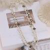 Elegant Pearl Four-Leaf Clover Women's Necklace - Versatile Layered Sweater Chain for Autumn/Winter