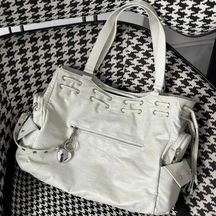 

Весенне-летняя нишевая сумка-тоут большой вместимости на кулиске, сумка для поездок на работу, большая наплечная сумка с заклепками в стиле локомотива