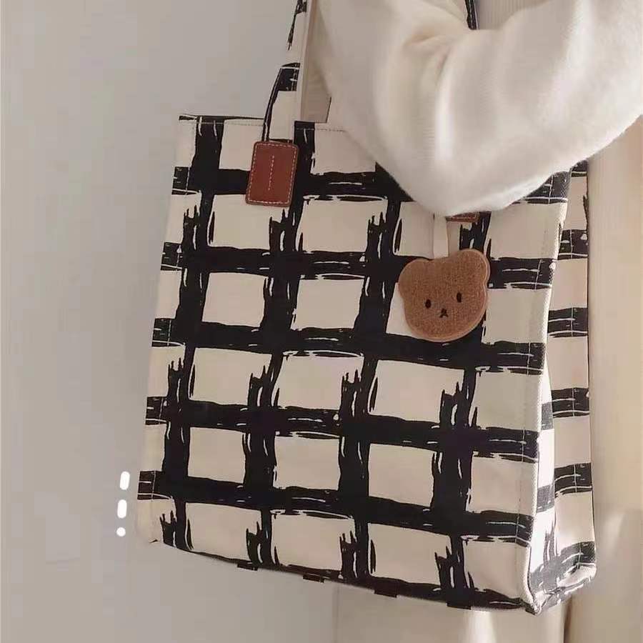Canvas bag Female versatile student class bag Shoulder bag Women's new model Portable Yukang