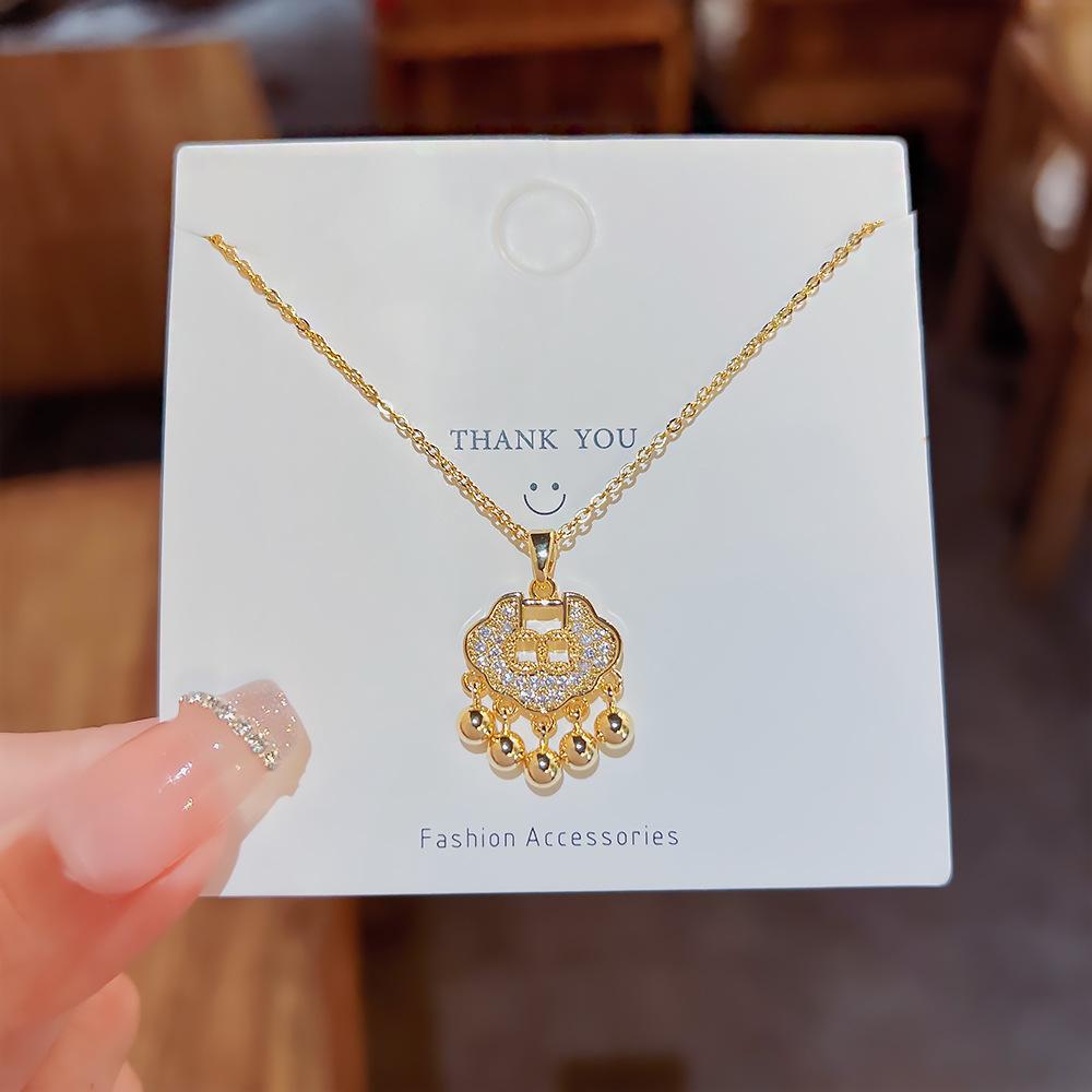 Design en følelse av sikkerhetslås studentanheng 18K gull mote kragebenskjede for å sende barn lykkebringende gaver lang levetid lås halskjede.