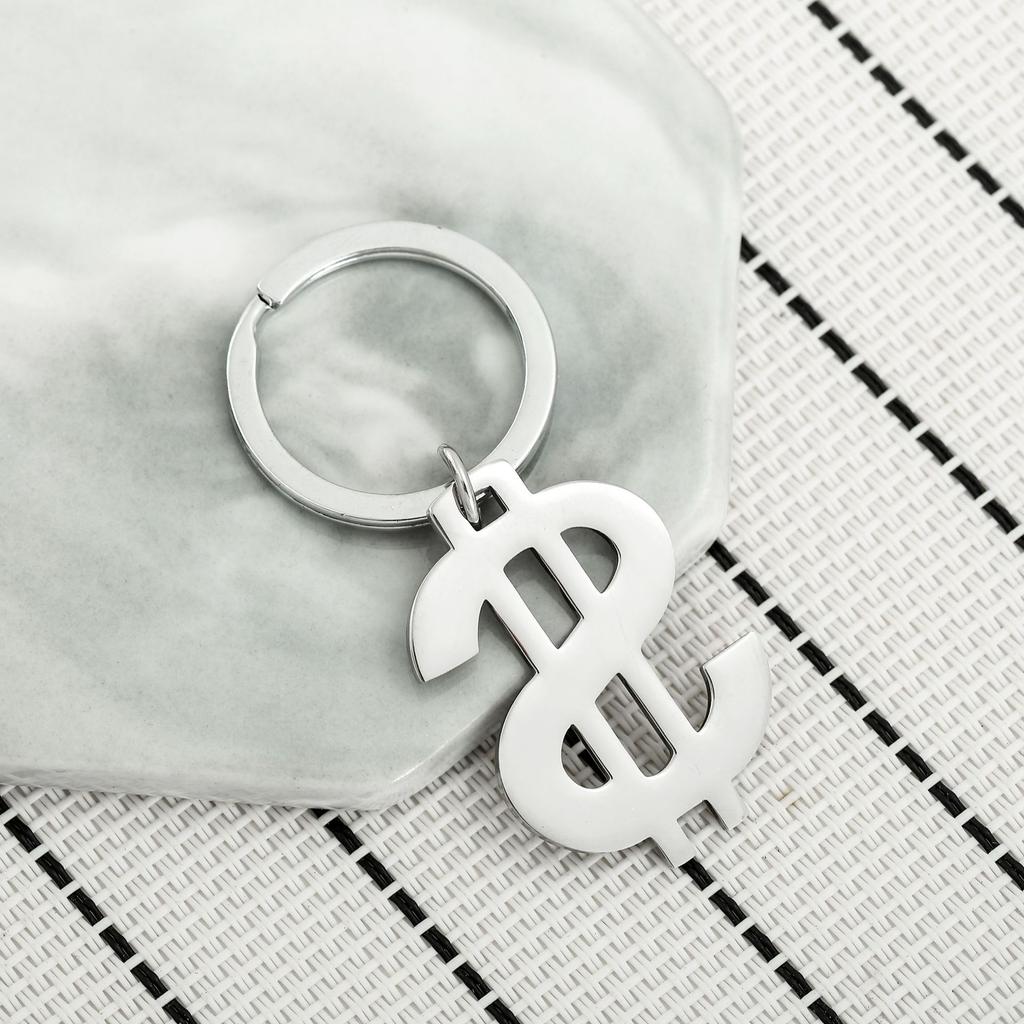 Symbol amerického dolaru Klíčenka z nerezové oceli Módní design měny Stylový přívěsek na klíče od auta Praktický denní doplněk ke klíčům