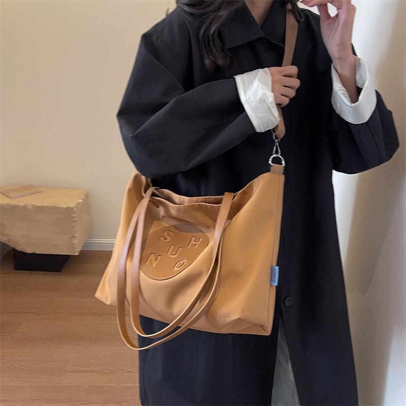 

Canvas bag, large capacity single shoulder crossbody bag, commuting tote bag