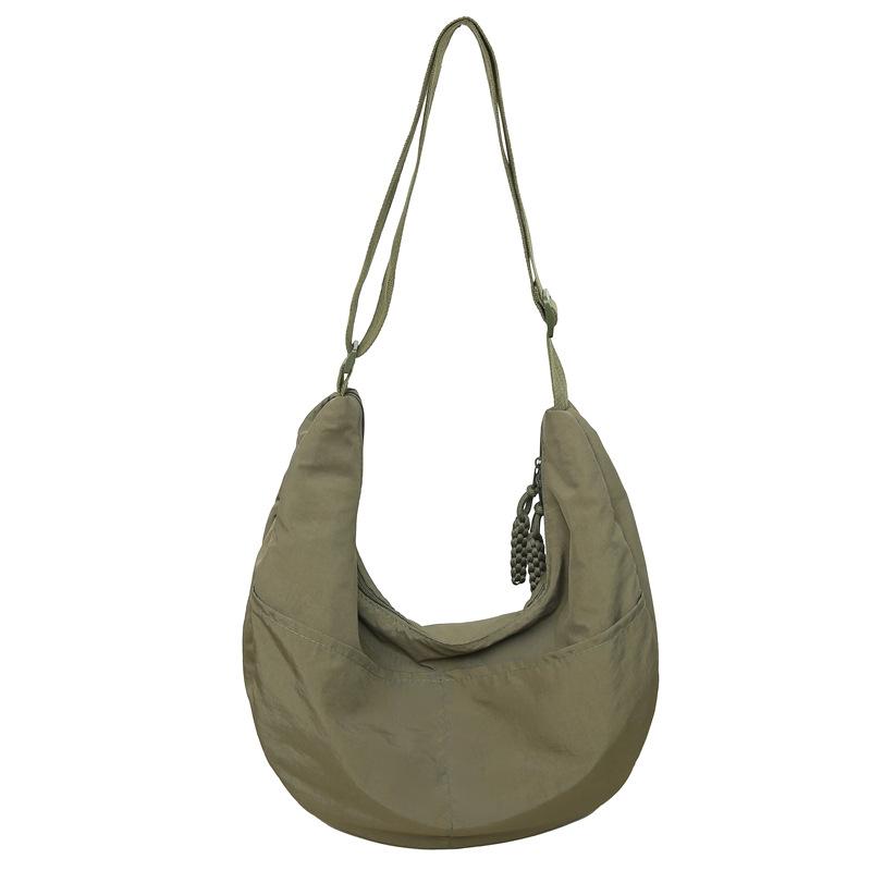 

Fashion versatile men s and women s casual bags Nylon messenger bags New dumpling bags Commuter shoulder bags зелёный