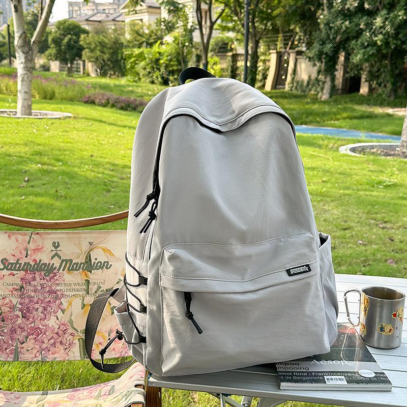 Large capacity schoolbag male high school students college students Japanese travel backpack female junior high school students computer backpack tide
