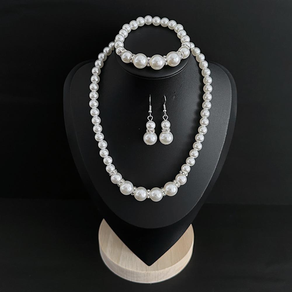 

Elegant Zircon Set Luxurious Necklace, Bracelet, and Earrings - Perfect for Everyday Wear and Special Occasions мідний
