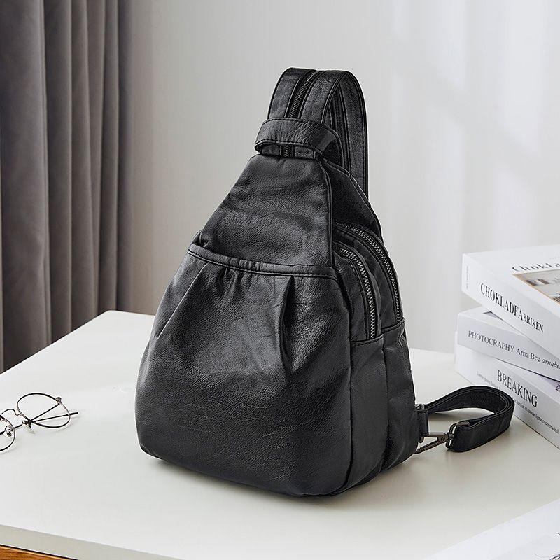 

Backpack Women s 2025 New Arrival Stylish and Versatile Mini Lightweight Goatskin Small Backpack Women s Niche Style Leather Chest Bag Black