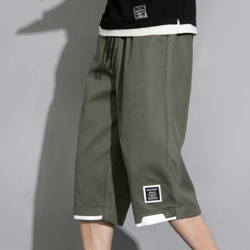 Summer Man Všestranné Ležérní šortky Koreon Streetwear Móda Pružný pas Baggy Khaki Černá Zelená Velká velikost Capri Kalhoty 8XL