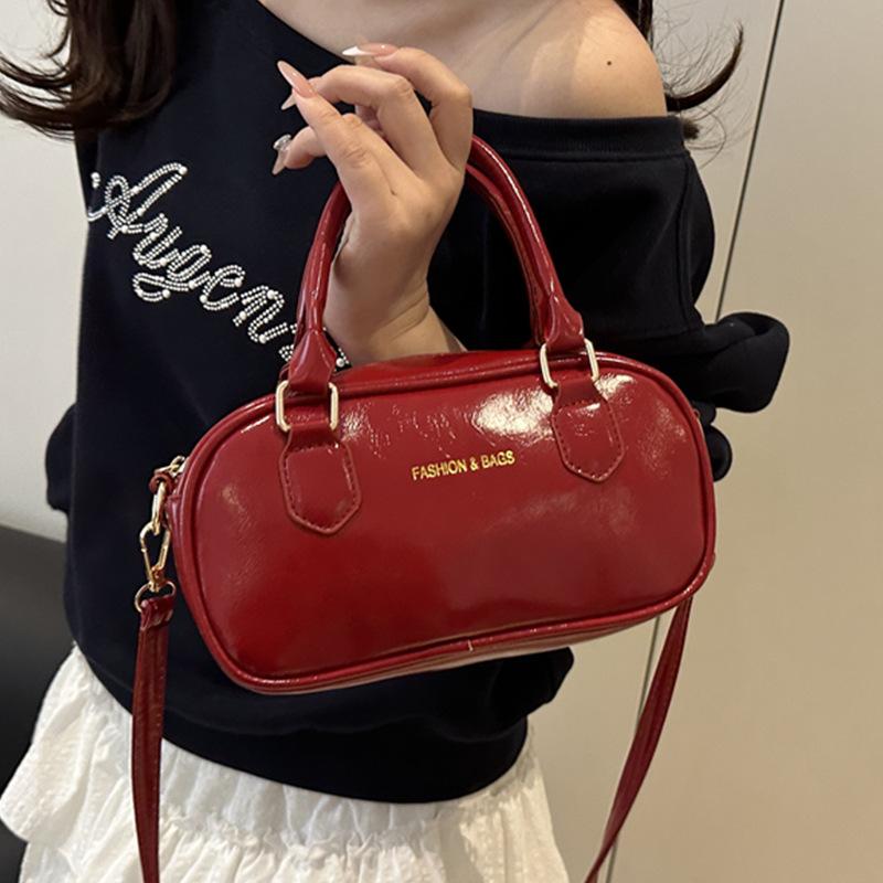 Hand carry fashion tote bag 2025 spring and summer new simple casual shoulder bag high-end trend oblique span bag