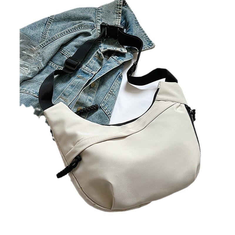 Niche simple canvas bag new nylon dumpling bag women's tide with one shoulder messenger bag light armpit bag