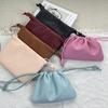 Women's 2026 New Korean Style Lambskin Cloud Bag: Fashionable Pleated Design, Versatile Drawstring, Single Shoulder, Crossbody Bag.