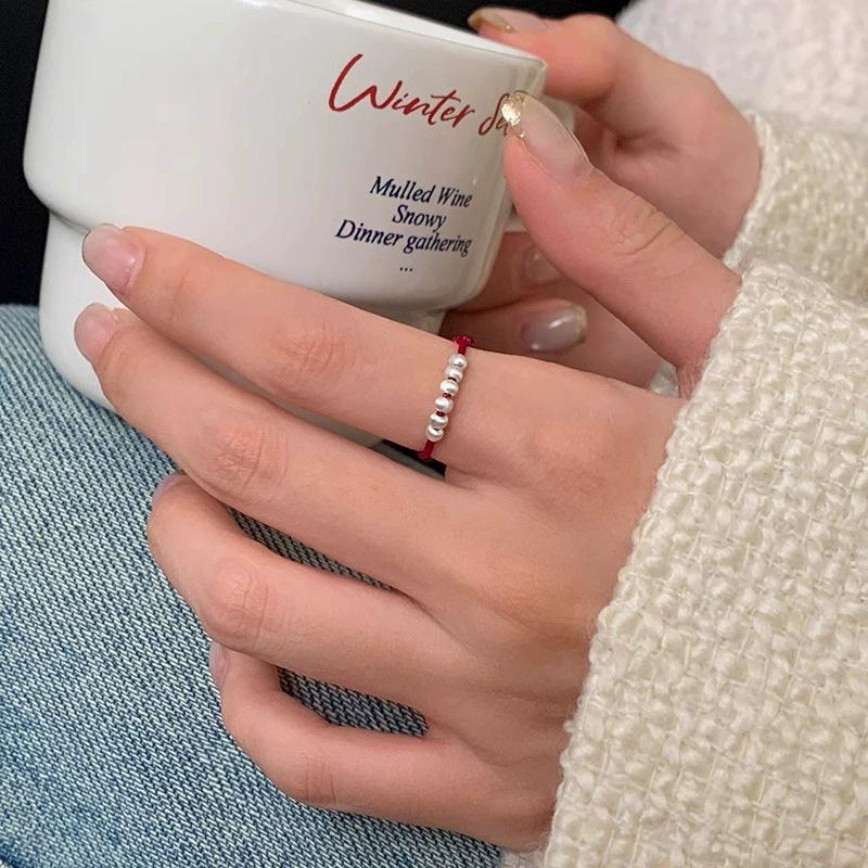 Trendy Ethnic Red String Woven Bead Ring for Women - Simple, Fashionable, Versatile Chinese Style Finger Accessory.