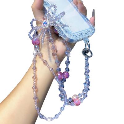 Lanière pour téléphone bandoulière Heidi avec breloque de sac en perles et pendentif en cristal