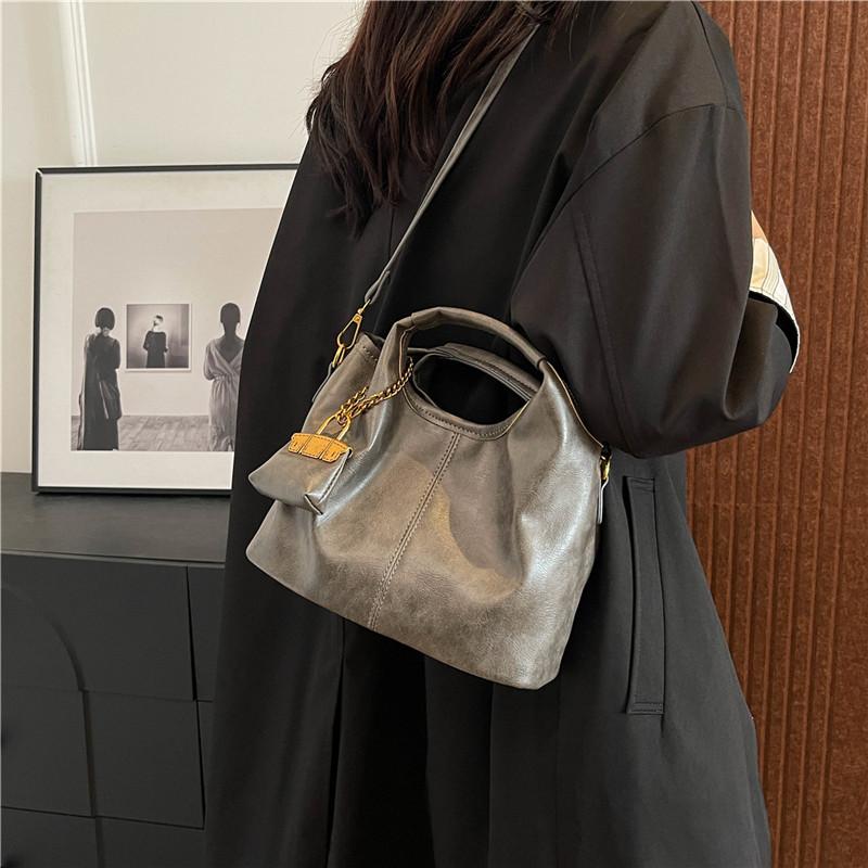 Retro niche handbag bag women's new high-end commuting large-capacity shoulder messenger bag mother and child bag