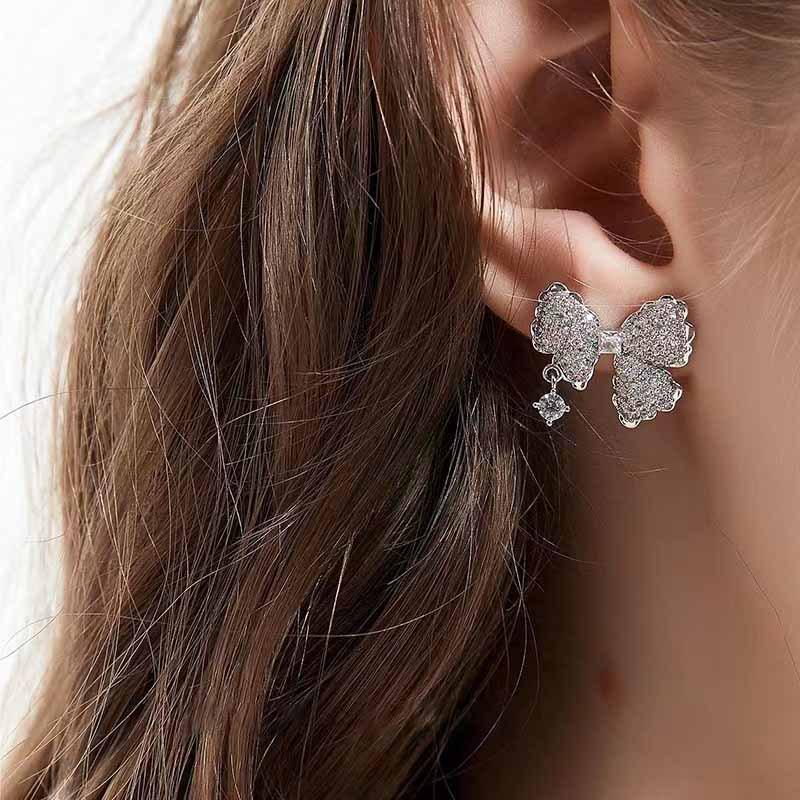 Elegant Asymmetrical Diamond Bow Drop Earrings