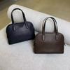 Niche first-layer cowhide minimalist 2026 new spring and summer shell bag single shoulder crossbody portable commuter bowling bag