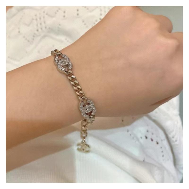 CHANEL Interlocking simple metal brass gold and silver crystal bracelet women's style