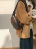 Vintage Coffee Colored Cow Horn Bag, Women's Armpit Bag, New Fashionable and Versatile Crossbody Bag, Dumpling Bag