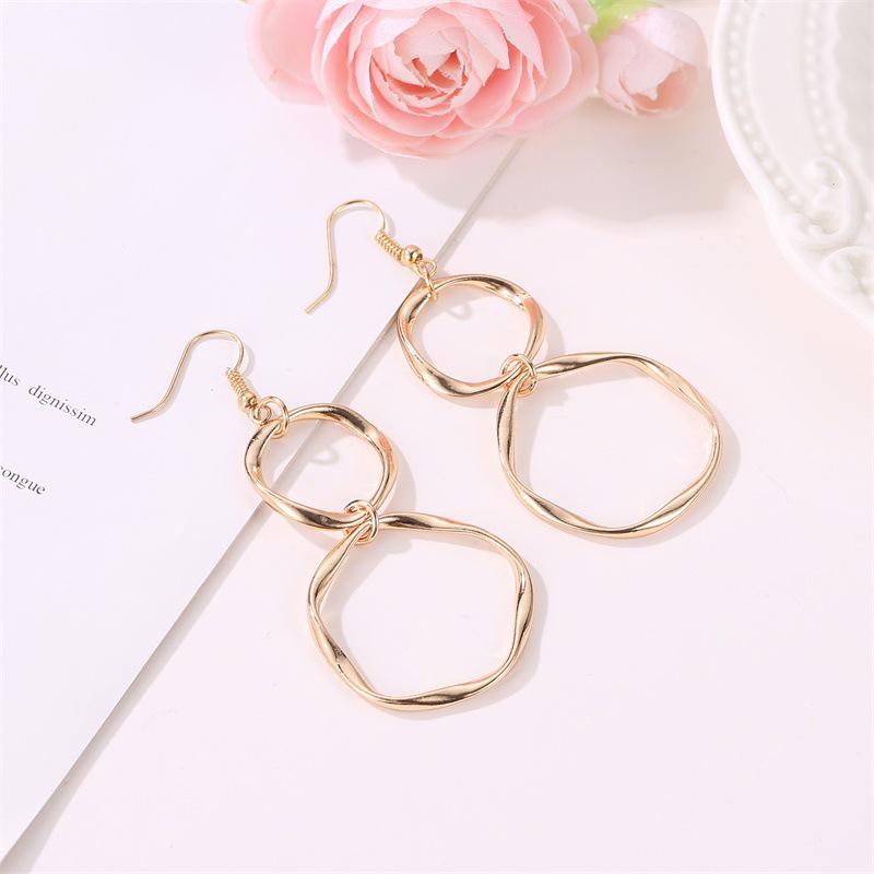 European & American Style Geometric Alloy Drop Earrings: Simple, Hollow, Round Design for Women.