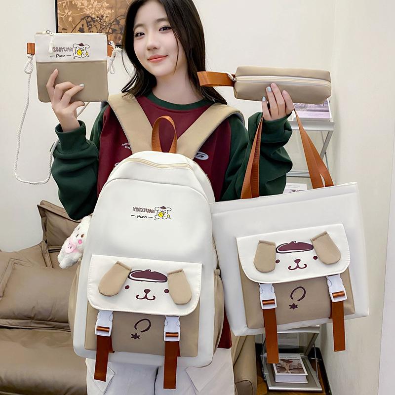 School bag new cartoon cute primary school schoolbag four-piece large-capacity middle school student backpack burden reduction casual backpack women