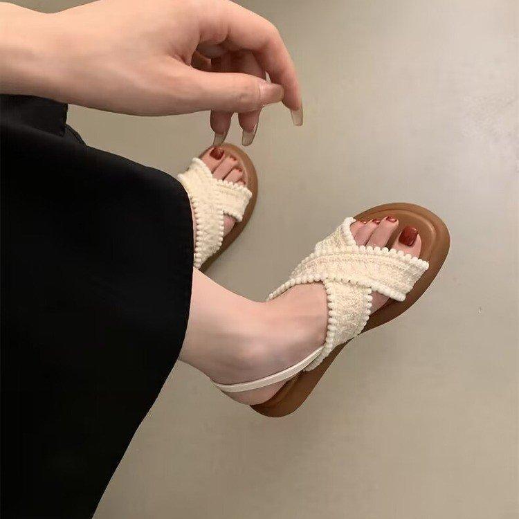 Thick-soled flat-soled sandals female 2025 new versatile retro ethnic fairy evening wind beach outside slippers sandals