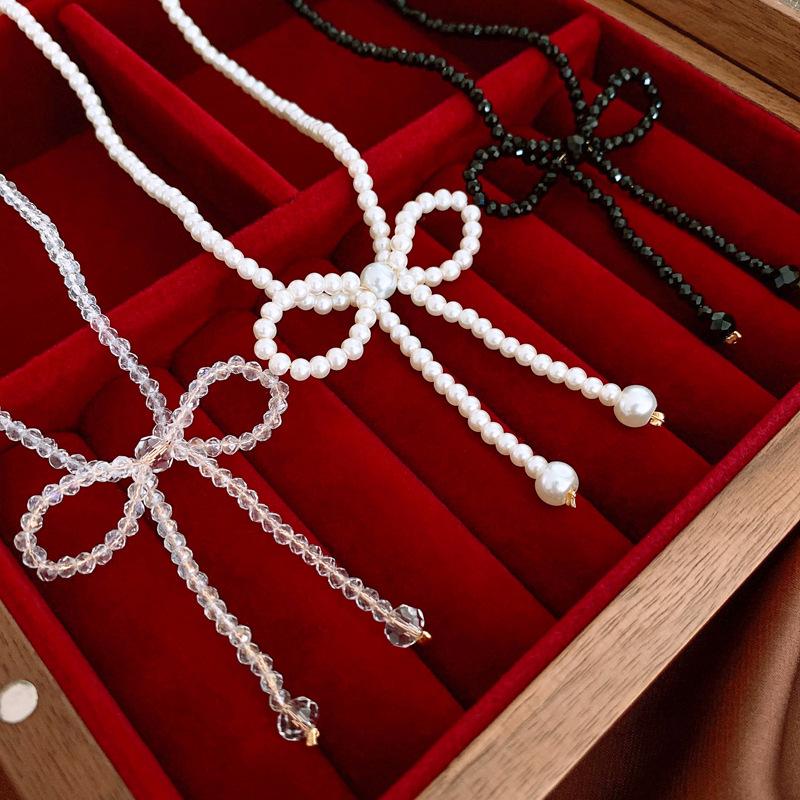 Sweet imitation pearl crystal woven bow collarbone necklace super fairy niche high-end choker necklace